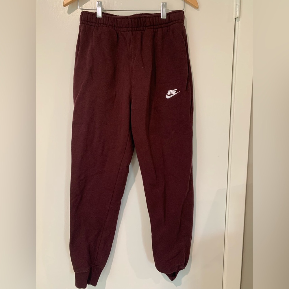 Nike mens small fleece joggers. Maroon color.